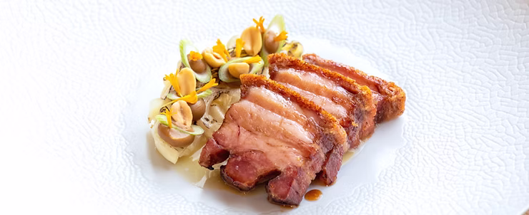 Crispy juicy pork belly with cabbage miso