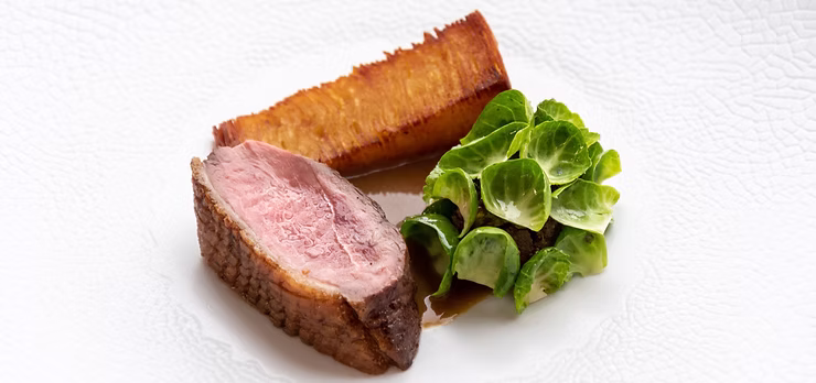 Honey glazed duck breast with the best potato ever