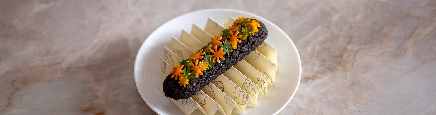 Carrot & sunflower seed eclairs