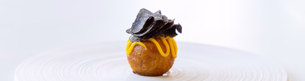 Oxtail beignets with truffle salted mandarin