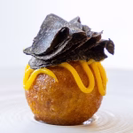Oxtail beignets with truffle & salted mandarin 1 Oxtail beignets with truffle & salted mandarin