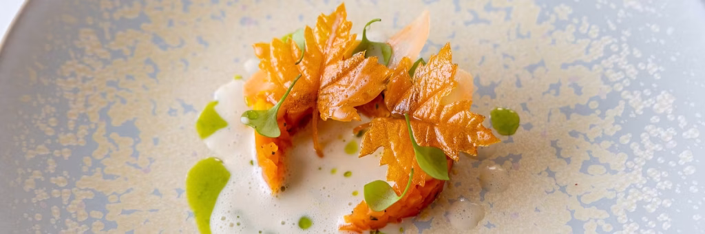 Salt crust carrots smoked beurre blanc dish