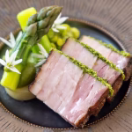 Smoked pork belly with lovage crumb and green peas